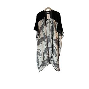 Randi & Will NWT women’s sleeveless open front animal print cardigan size large
